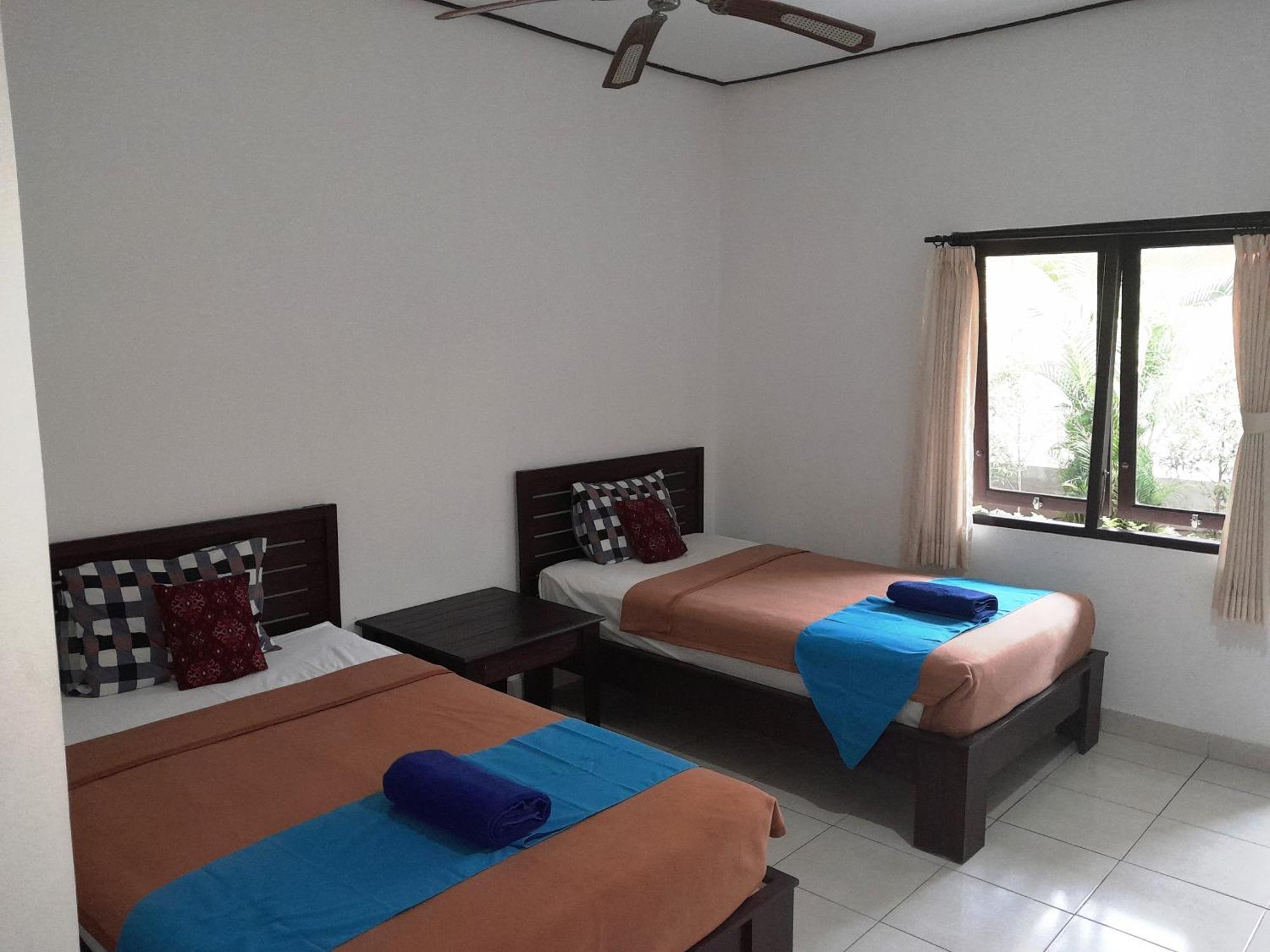 Star East Bungalows Amed Buitenkant foto