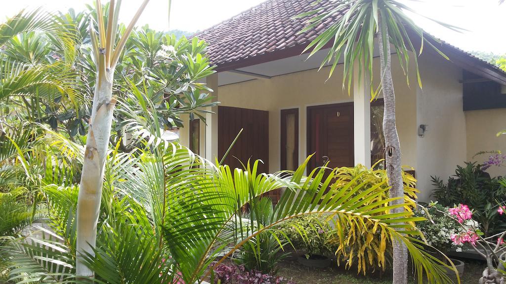 Star East Bungalows Amed Buitenkant foto