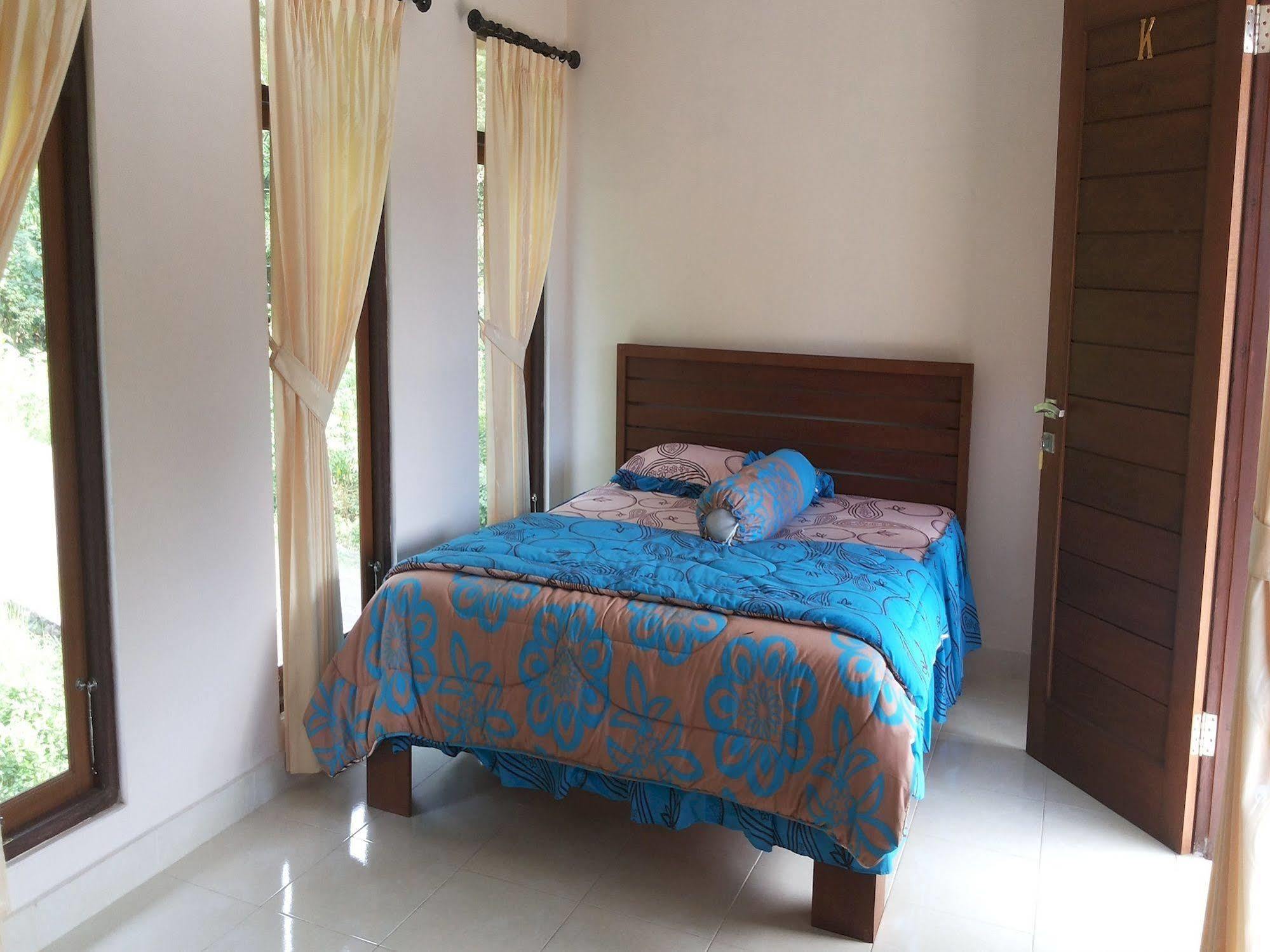 Star East Bungalows Amed Buitenkant foto