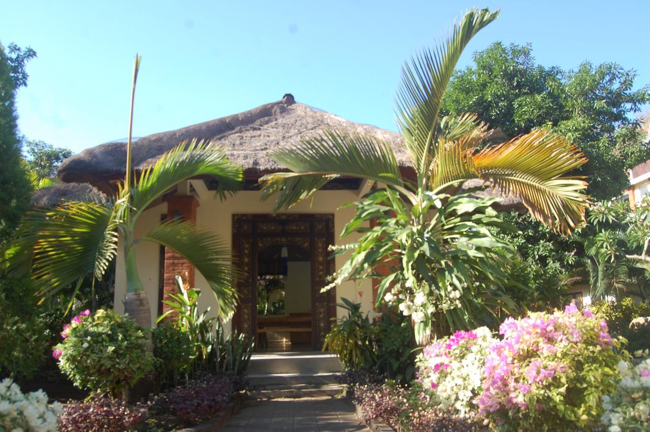 Star East Bungalows Amed Buitenkant foto