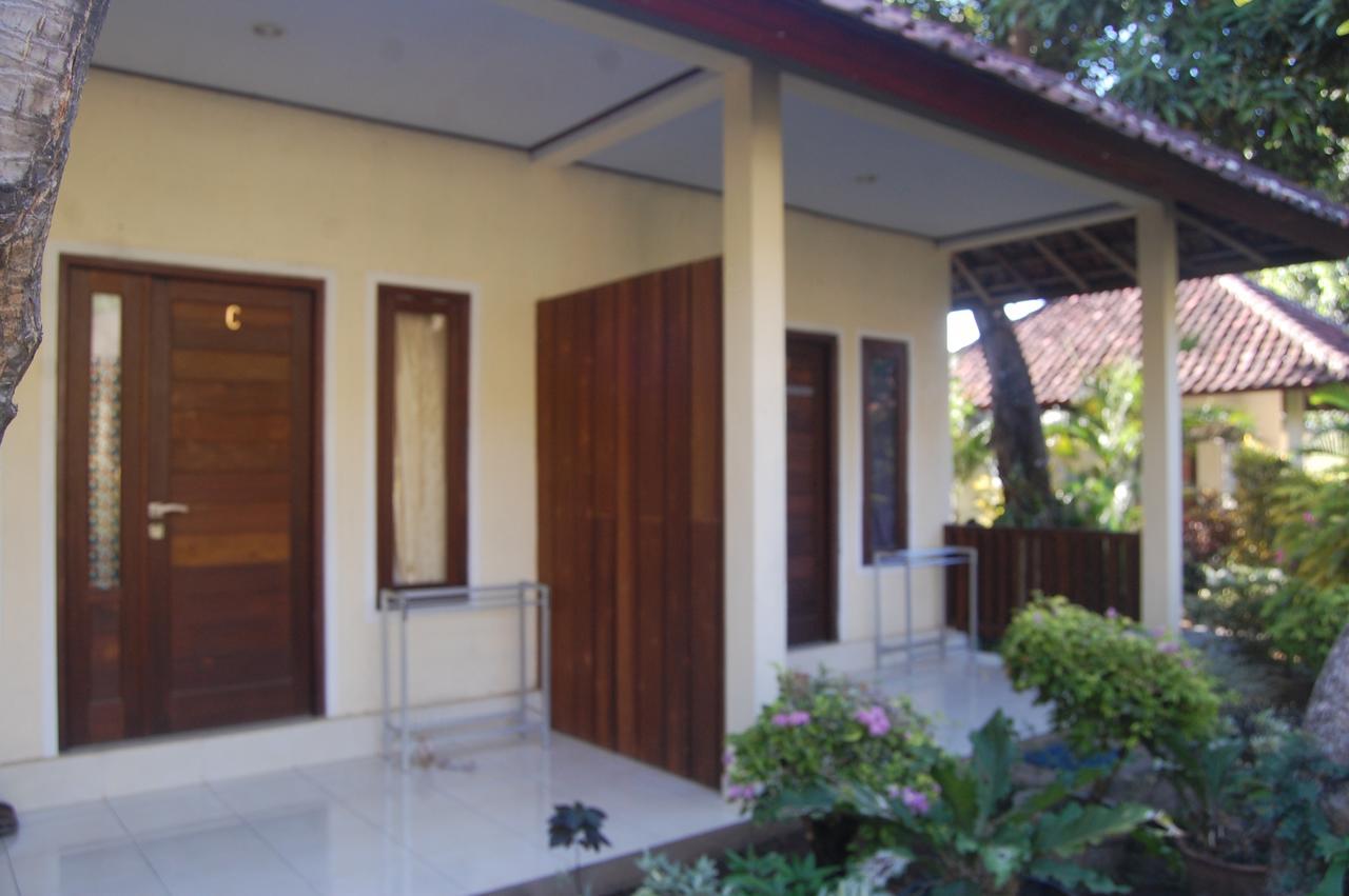 Star East Bungalows Amed Buitenkant foto