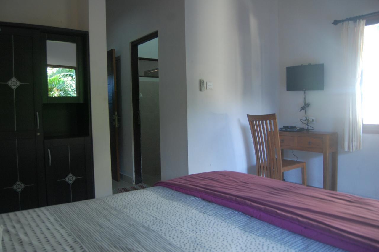 Star East Bungalows Amed Buitenkant foto