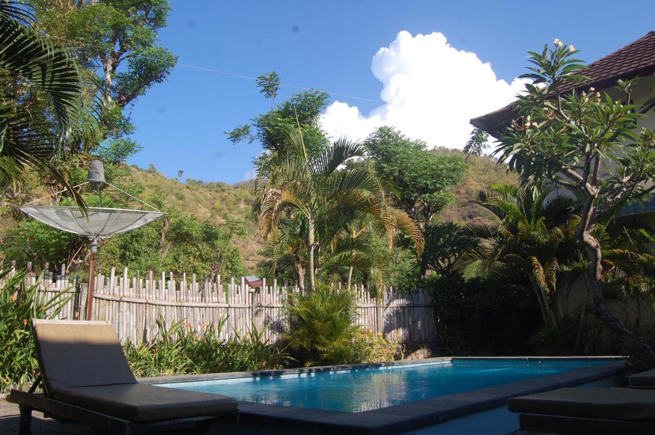 Star East Bungalows Amed Buitenkant foto