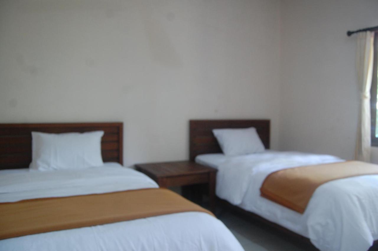 Star East Bungalows Amed Buitenkant foto